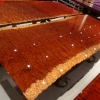The Epitome of Natural Grandeur: The Massive Live Edge Bubinga Slab Table