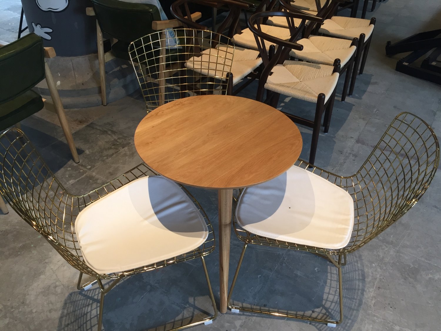 Round oak coffee table and steel net chair