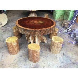 Round iroko wood slab coffee table