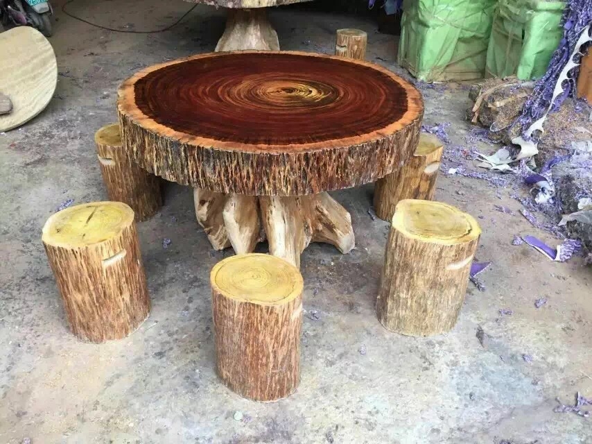 Round iroko wood slab coffee table
